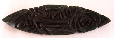 BP119 heavily carved dk green bakelite pin